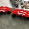 Brembo brakes calipers with brakes lines.